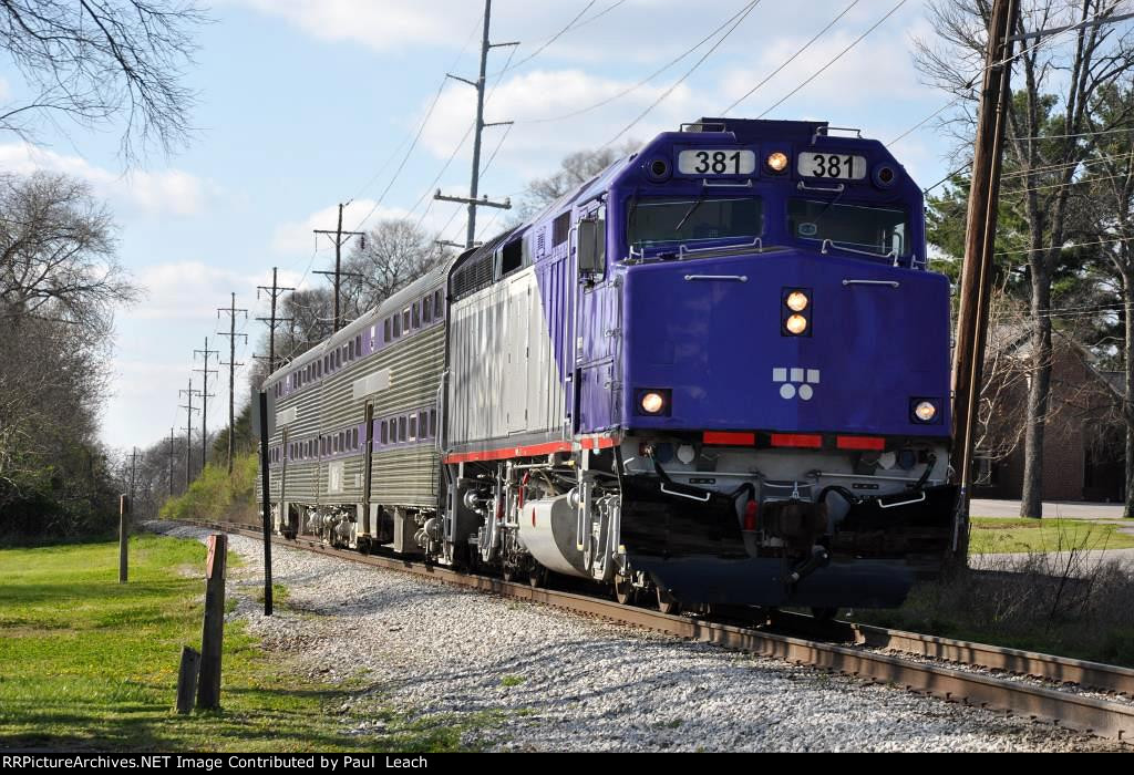 Outbound commuter approaches the station